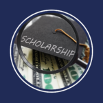 the word scholarship written on a graduation cap on top of some money